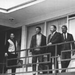 This April 3, 1968, file photo shows Rev. Martin Luther King Jr., second from right, standing with other civil rights leaders on the balcony of the Lorraine Motel in Memphis a day before he was assassinated at approximately the same place. From left are Hosea Williams, Jesse Jackson, King, and Ralph Abernathy.
